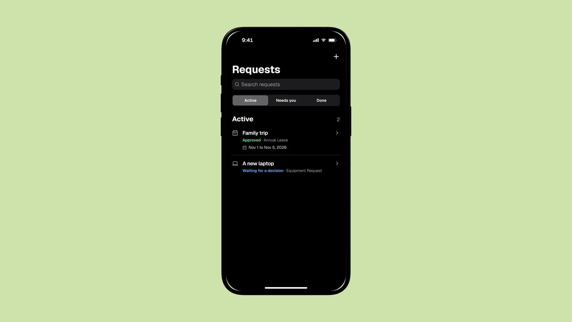 Requests on the phone: an approved leave and a laptop waiting for a decision.